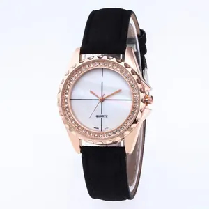 Detailed macro view of a rose gold watch bezel with high-density sparkling crystals