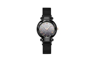 Detail of a ladies' magnetic watch with gradient starry dial and faceted crystal glass