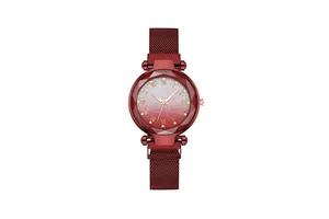 Detail of red gradient star dial with Roman numerals and faceted glass for lady watch