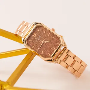 Orologio al quarzo rettangolare da donna in oro rosa con quadrante effetto legno