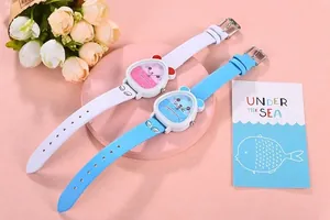 Detail of cute cartoon bear quartz watches for girls in white and blue with leather straps