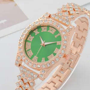 Elegant rose gold women's watch with green Roman dial and sparkling rhinestone strap