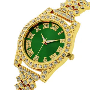 Women's luxury gold quartz watch with green Roman dial and rhinestone encrusted band