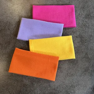 Set of four colorful elastic knitted headbands for sports and daily casual wear