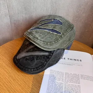 Vintage washed cotton flat caps in green and black with Boston embroidery and Z patch