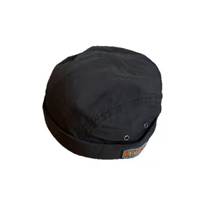 Black Japanese ripstop cotton docker hat with Rider patch and metal eyelets