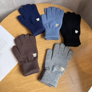 Five pairs of winter knitted gloves with cute bear embroidery in multiple colors