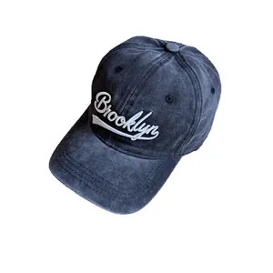 Vintage washed navy baseball cap featuring white Brooklyn embroidery on cotton twill