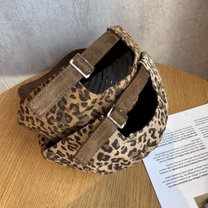 Retro leopard print beret hat with adjustable brown strap and silver metal buckle