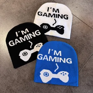 Set of three jacquard knit beanies with I'M GAMING text and controller pattern