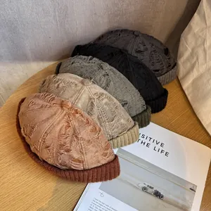 Vintage distressed knit docker cap with torn lace texture in five various earth tone colors