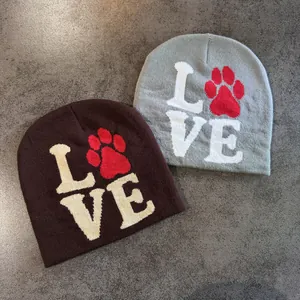 Knit beanie hat in dark brown and grey featuring LOVE embroidery with a red paw print