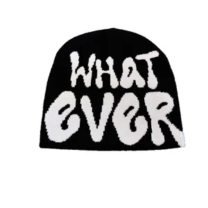 Street style black knit beanie with white WHAT EVER jacquard lettering for autumn winter