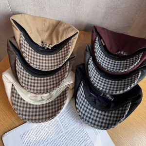 Japanese retro newsboy hats in assorted colors with plaid lining and metal buckle adjustment