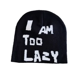 Unisex black knit beanie with I AM TOO LAZY white jacquard text for winter warmth