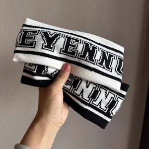 Bandeau de sport élastique pour femme en tricot avec motif jacquard de lettres EYENNI noir et blanc