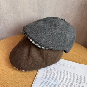 Japanese retro plaid newsboy cap in brown and grey wool fabric for a vintage artistic look