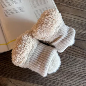 Winter plush knit gloves for women featuring warm faux sheepskin lining in beige