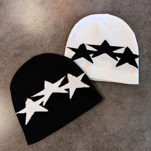 Minimalist knit beanie featuring black and white five-point star jacquard patterns