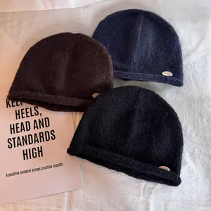 Chunky knit beanie hats in black, brown and navy with rolled brim and soft wool texture