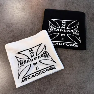 American style knitted cat ear beanie with iron cross and Homme Arcadecode lettering