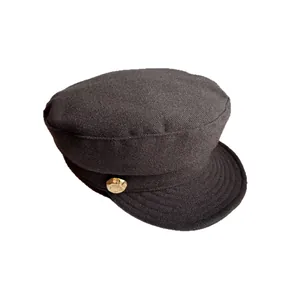 British vintage wool newsboy cap in black knit with gold metal side button for women