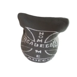 Grey knit cat ear beanie featuring white cross patterns and HOME lettering streetwear style