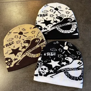 Graffiti style knit beanie with skull and star patterns for winter warmth and street style