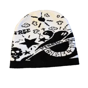 Y2K knit beanie with jacquard skull, stars, and 'FREE' text in black and white finish