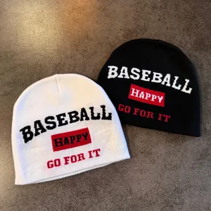 Black and white knit beanies with jacquard baseball and happy go for it slogans