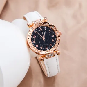 Reloj de cuarzo para mujer con esfera de cielo estrellado, caja de oro rosa y correa blanca