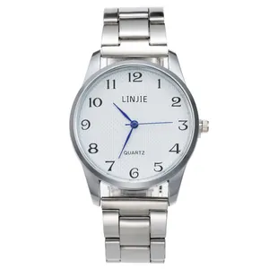 Montre à quartz classique en acier inoxydable argenté avec cadran blanc et aiguilles bleues