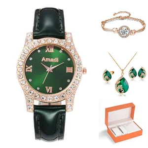 Coffret montre femme luxe Amadi verte et bijoux en or rose avec pierres émeraude