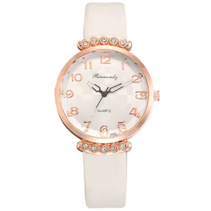 Women's quartz watch with white leather strap and rose gold rhinestone-studded bezel