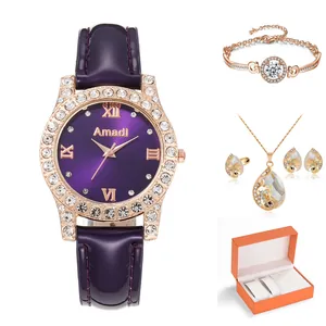 Coffret cadeau montre en cuir violet et bijoux or rose avec un élégant écrin orange