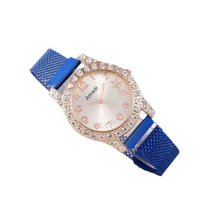 Montre quartz femme avec bracelet magnétique bleu, cadran étoilé or rose et cristaux