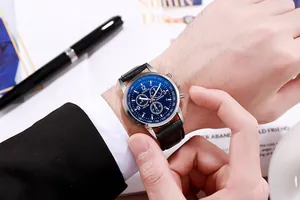 Close-up of Geneva men's quartz watch with blue sunray dial and black leather strap