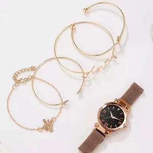 Detail of rose gold magnetic mesh watch set with star dial and cactus charm bracelet