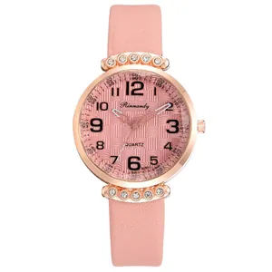 Close-up of pink quartz watch featuring rose gold case and sparkling crystal accents