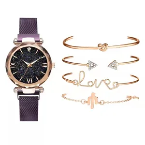 Women's starry sky quartz watch set with four rose gold bracelets on white background