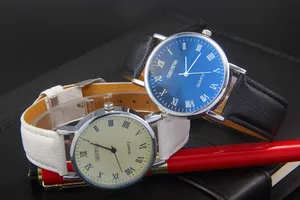 Classic Geneva quartz watches with Roman numeral dials on black leather notebook