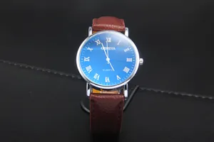 Detailed close-up of Geneva quartz watch with blue sunray dial and brown leather strap