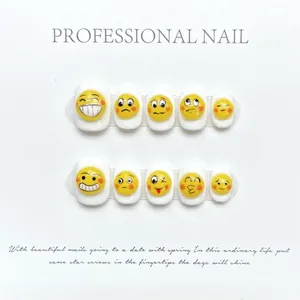 Handmade press-on nails with 3D yellow emoji faces on a glossy white base, 10-piece set
