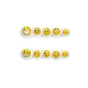 Handmade press-on nails with cute fried egg designs and yellow emoji faces on white base