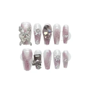 Handmade silver butterfly press-on nails with purple gradient and 3D floral accents
