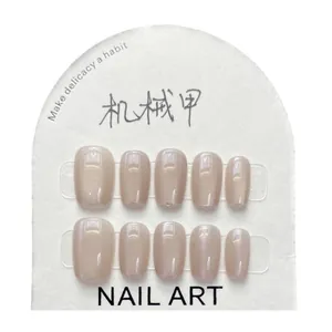 Short round nude cat eye press-on nails set in elegant champagne finish with 10 pieces