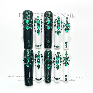 Handmade emerald green long ballerina press-on nails with sparkling rhinestones and gems
