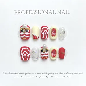 Detail of handmade press-on nails featuring red 3D lion dance and lucky Fu character