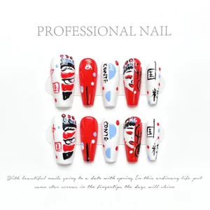 Detail of handmade press-on nails with Chinese Peking Opera and ink art design