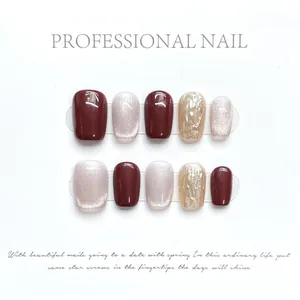 Detailed view of handmade dark red wine and silver cat-eye glitter press-on nails set